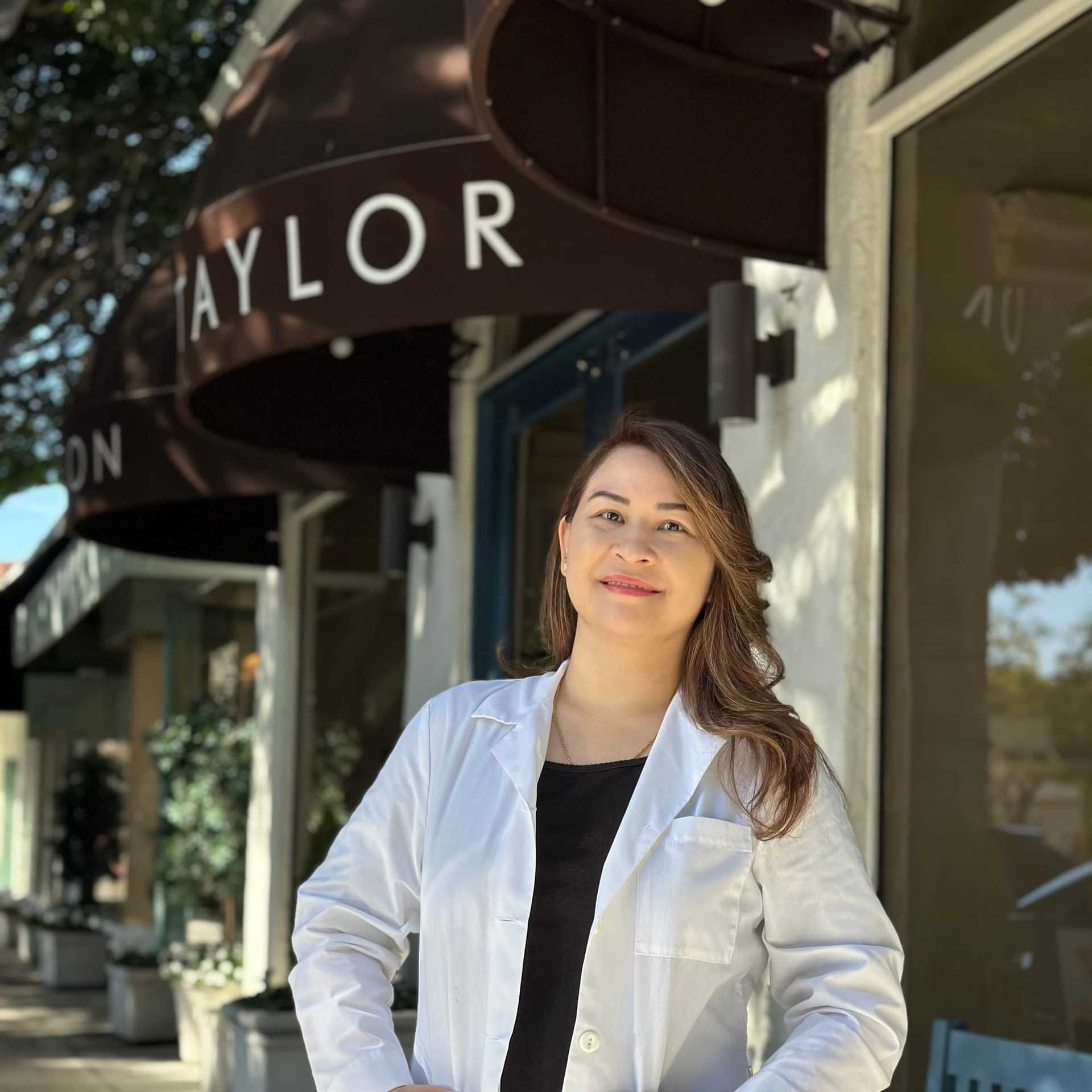 Portrait of Daisy Ramasutra, a professional stylist at Mark Taylor Salon & Spa, showcasing their expertise and style.