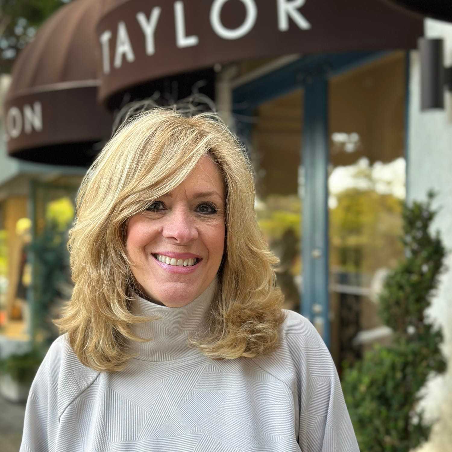 Portrait of Vickie Devaud, a professional stylist at Mark Taylor Salon & Spa, showcasing their expertise and style.