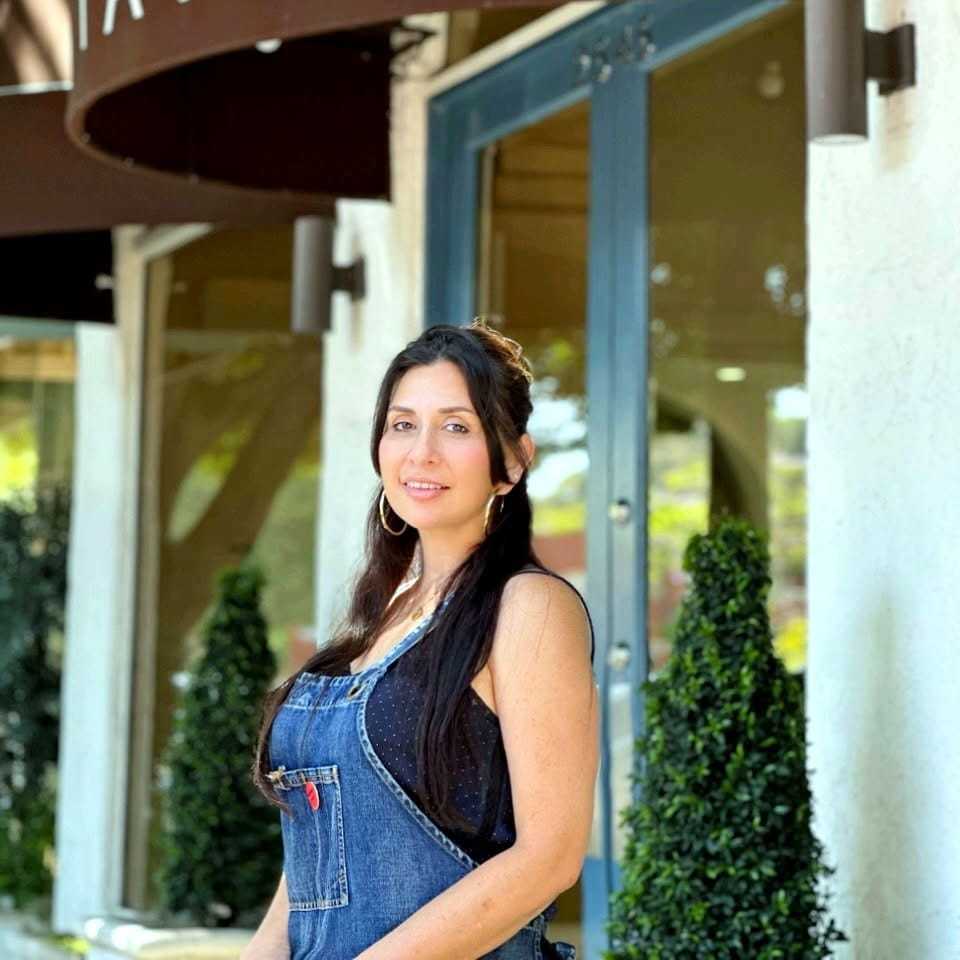 Portrait of Shahla Rabie, a professional stylist at Mark Taylor Salon & Spa, showcasing their expertise and style.