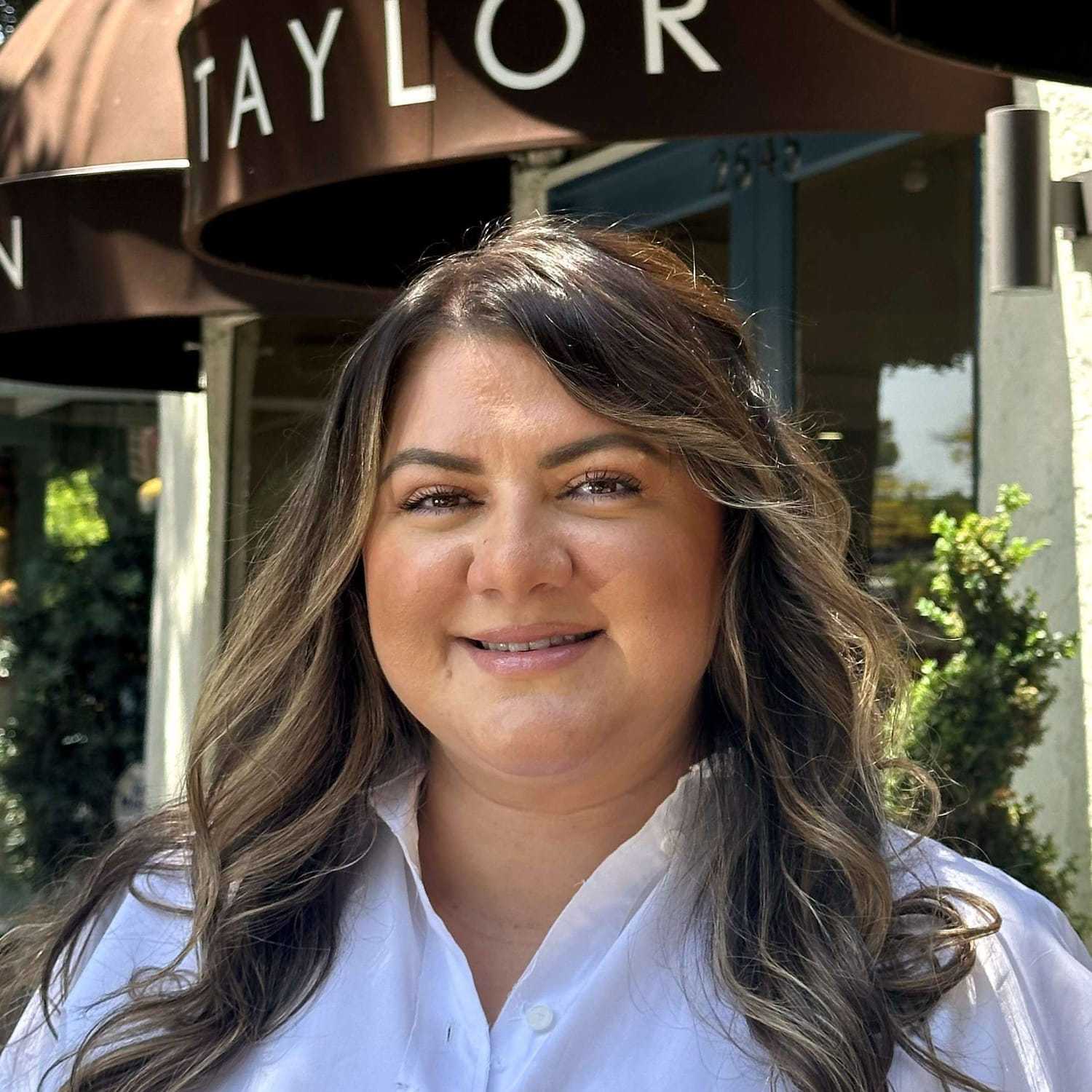 Portrait of Lucy Miller, a professional stylist at Mark Taylor Salon, showcasing their expertise and style.