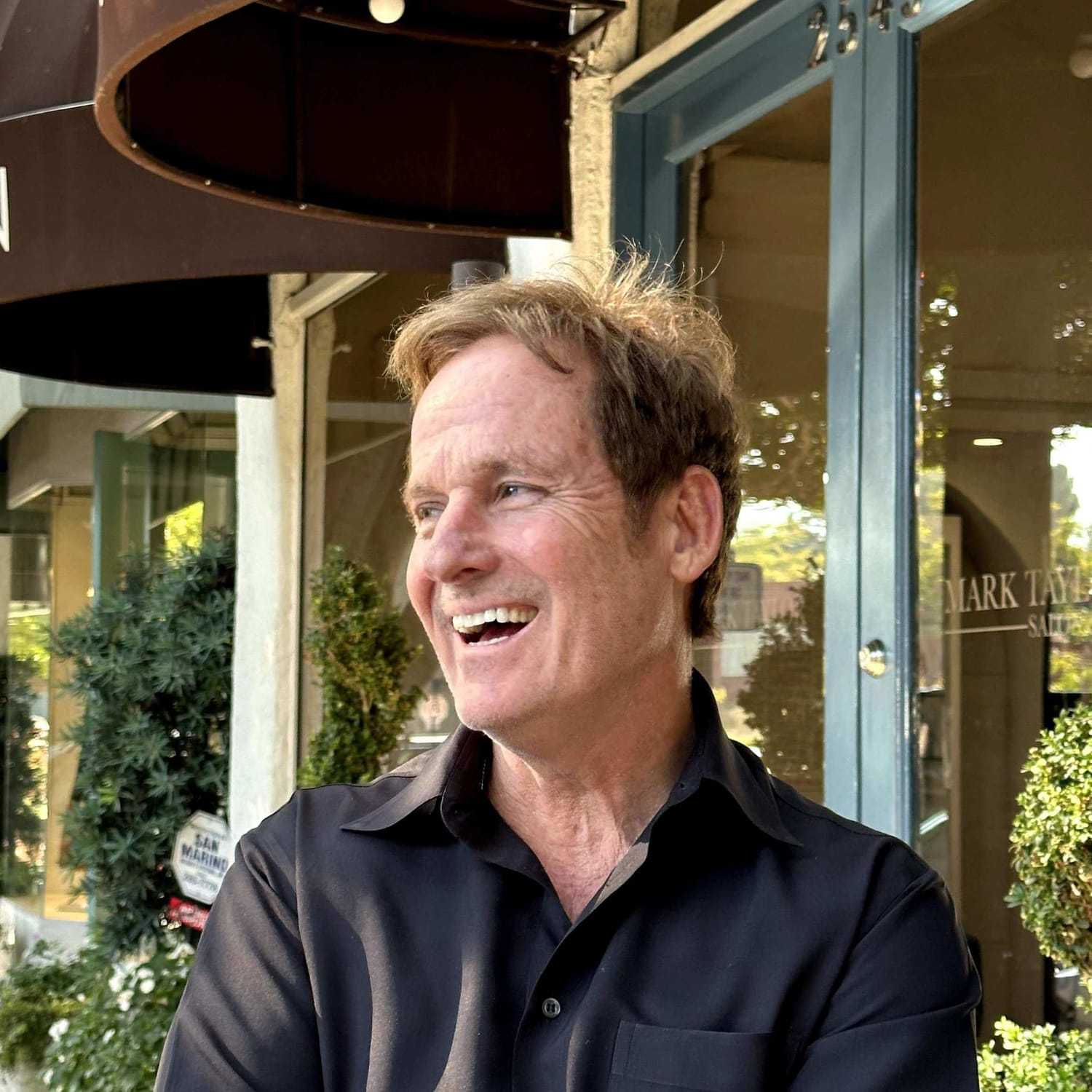 Portrait of Mark Taylor, a professional stylist at Mark Taylor Salon, showcasing their expertise and style.