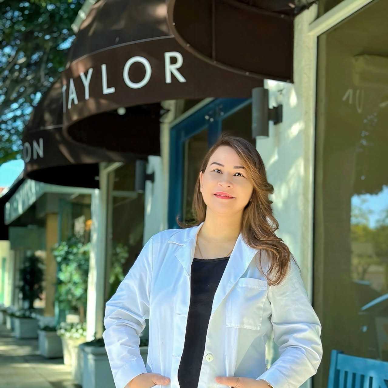 Portrait of Daisy Ramasutra, a professional stylist at Mark Taylor Salon & Spa, showcasing their expertise and style.