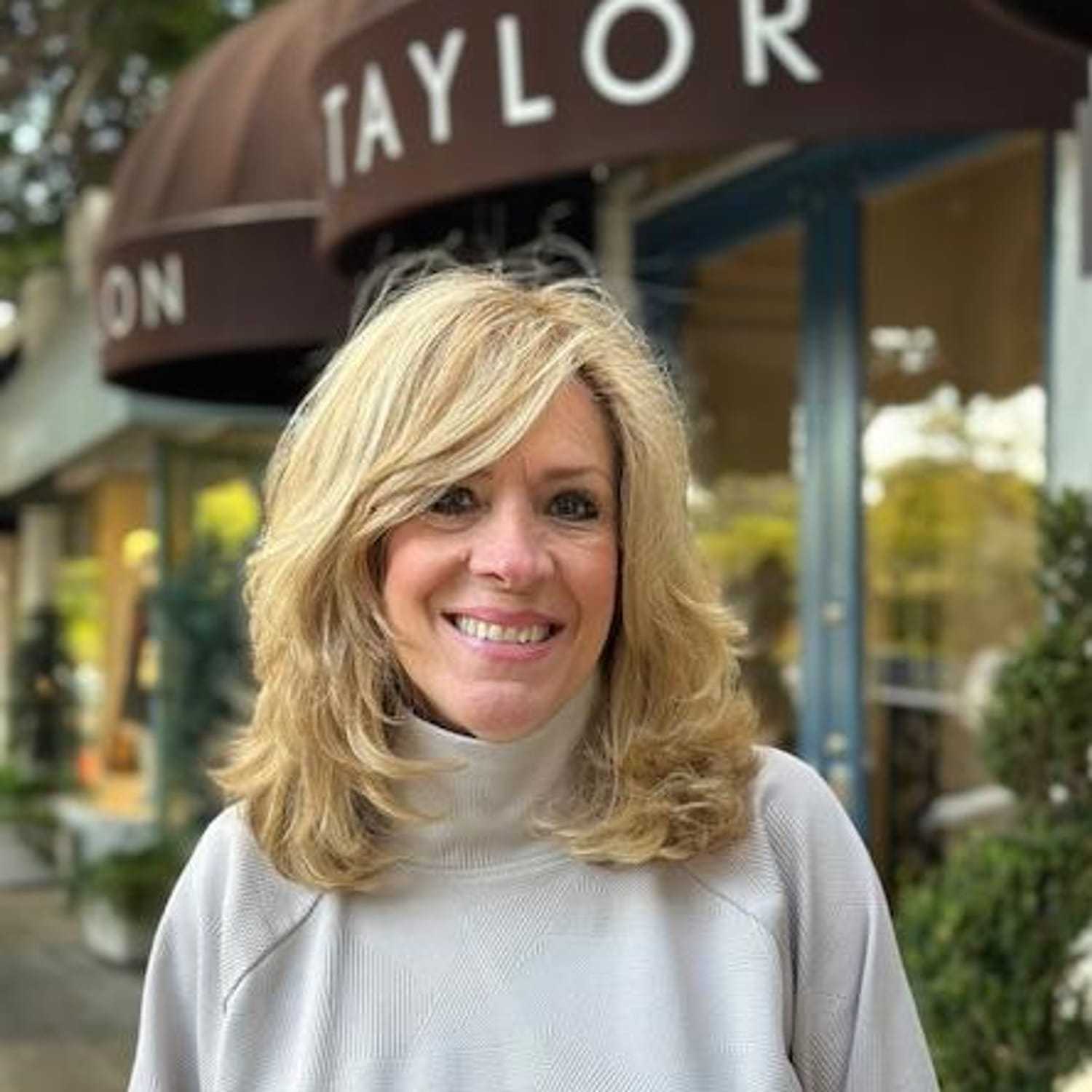 Portrait of Vickie Devaud, a professional stylist at Mark Taylor Salon, showcasing their expertise and style.