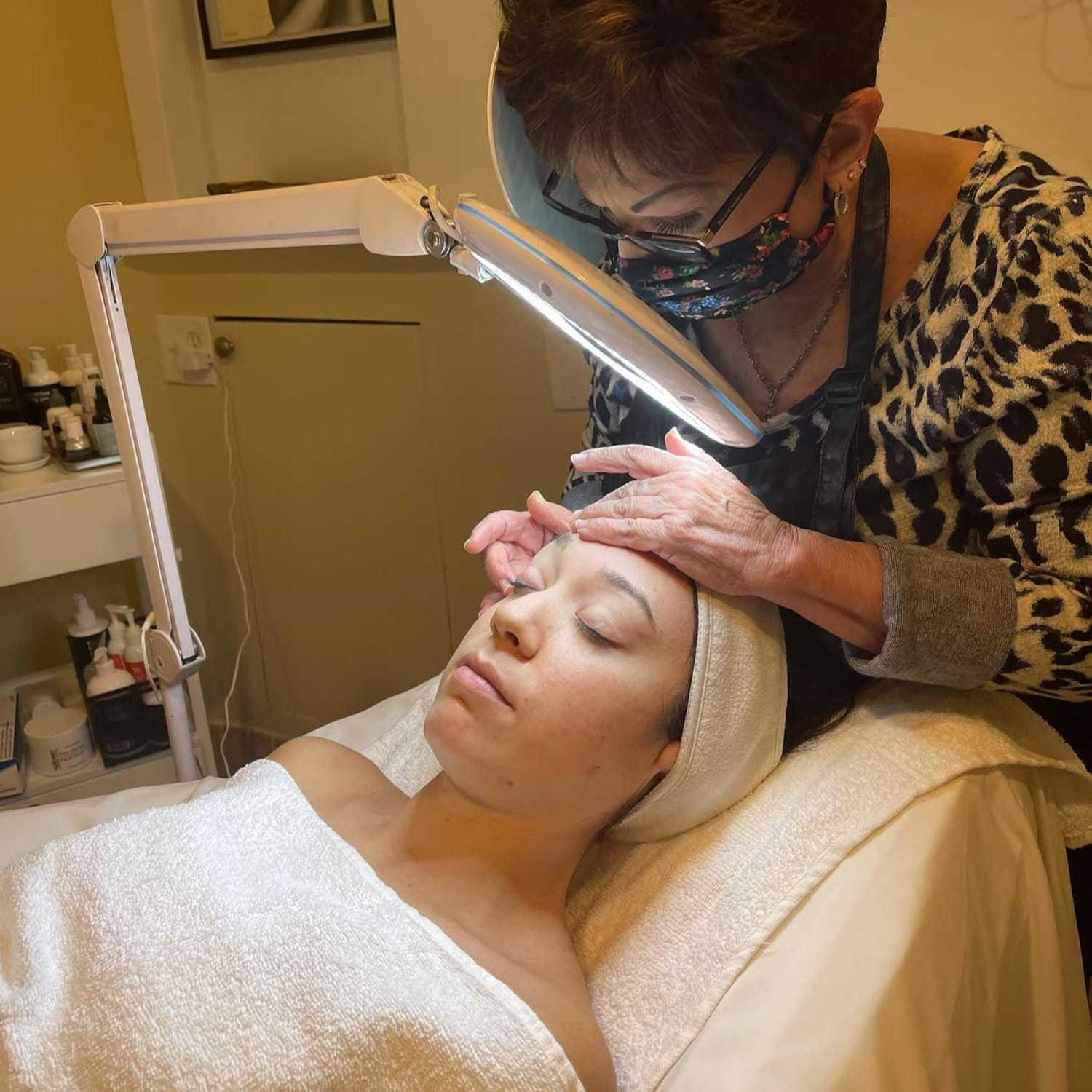 Portrait of Rebecca Lopez, a professional stylist at Mark Taylor Salon & Spa, showcasing their expertise and style.