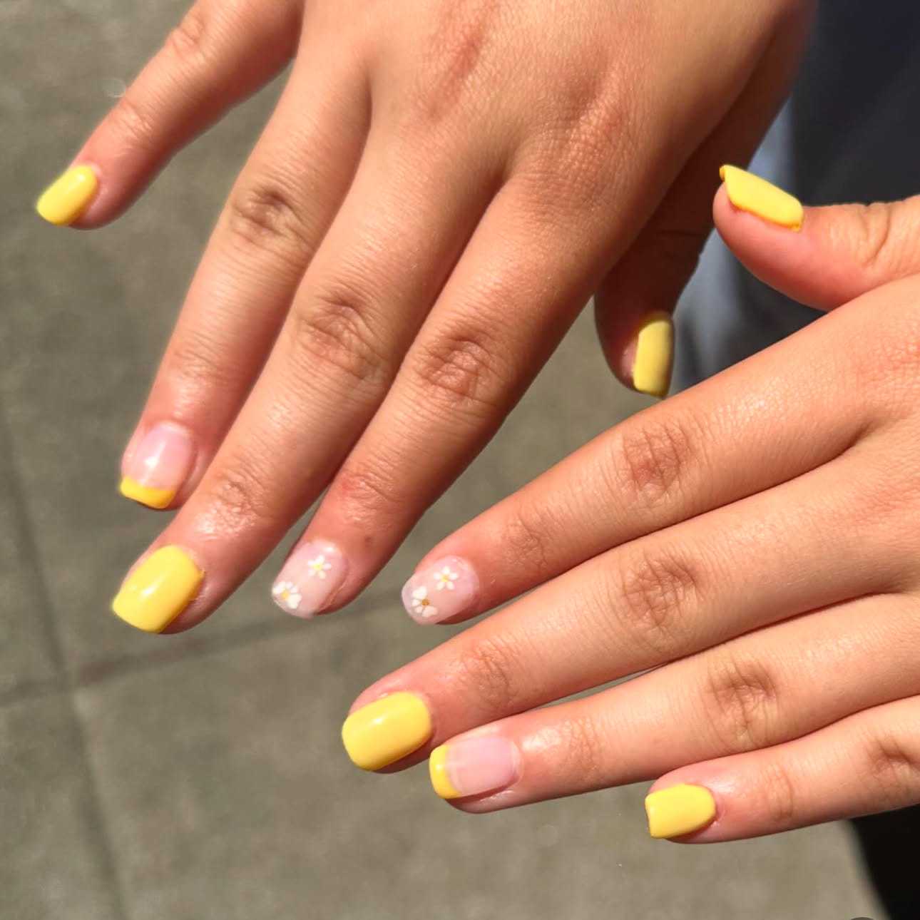 Portrait of Elisa Lee, a professional stylist at Mark Taylor Salon & Spa, showcasing their expertise and style.