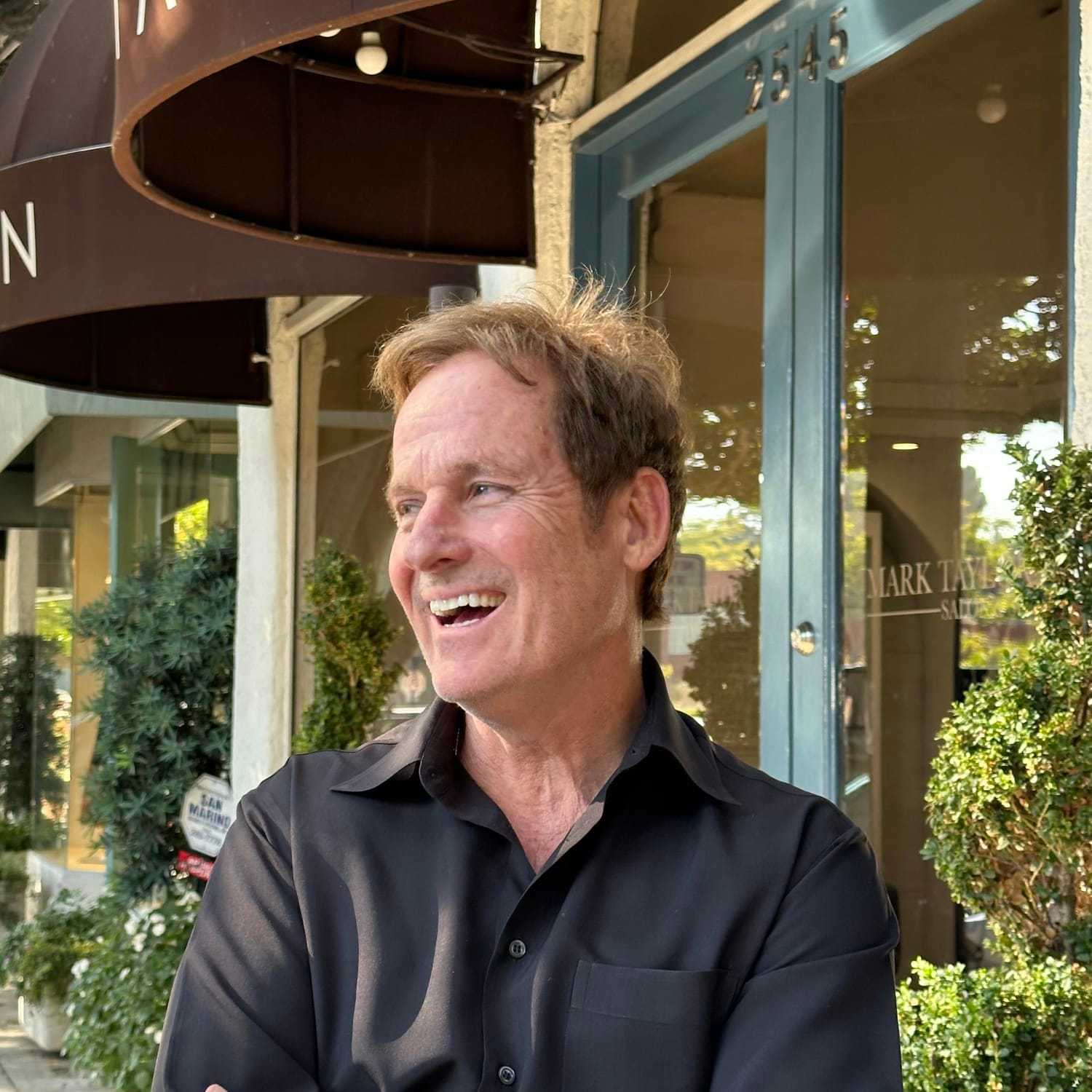 Portrait of Mark Taylor, a professional stylist at Mark Taylor Salon & Spa, showcasing their expertise and style.