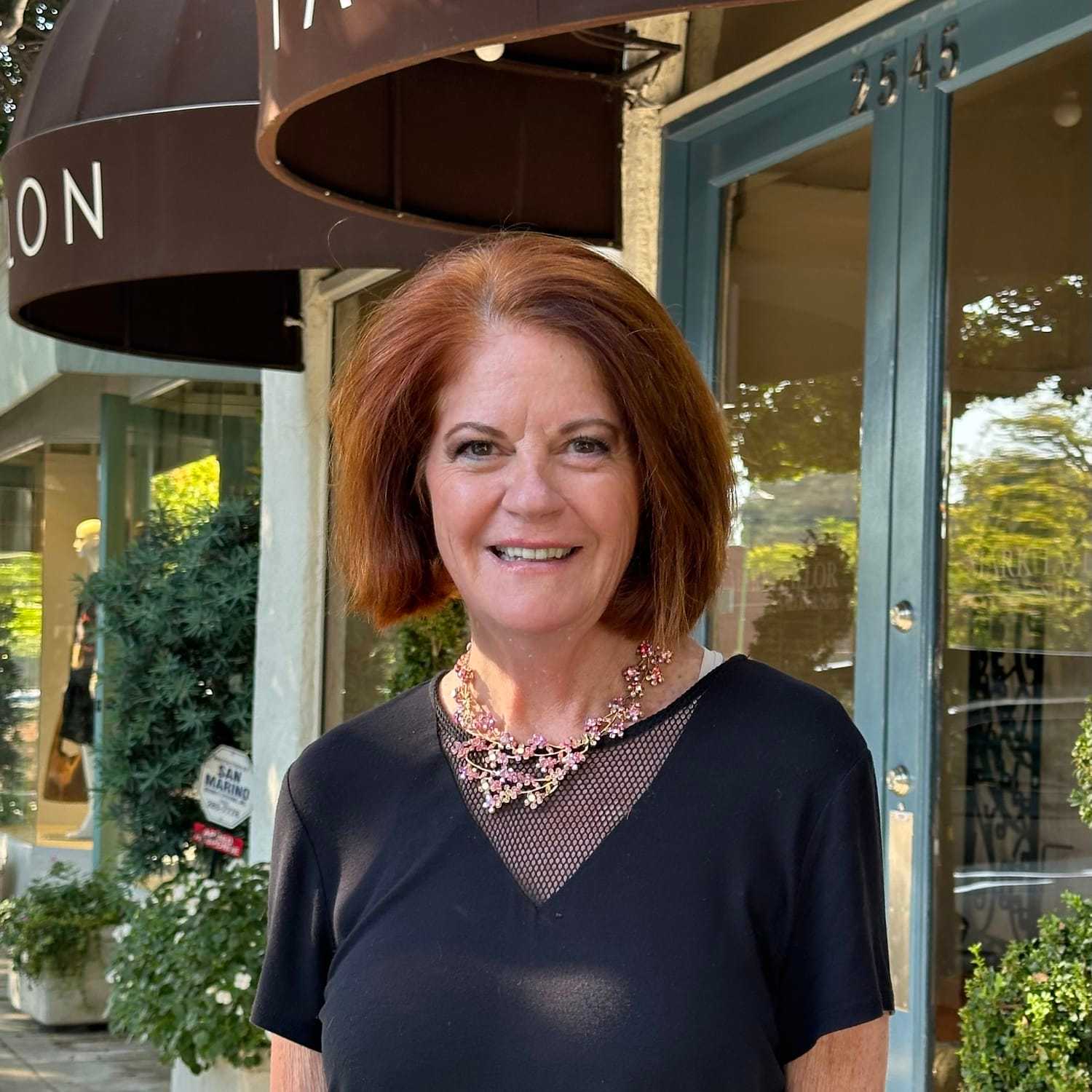 Portrait of Vickie Lanzarotta, a professional stylist at Mark Taylor Salon & Spa, showcasing their expertise and style.