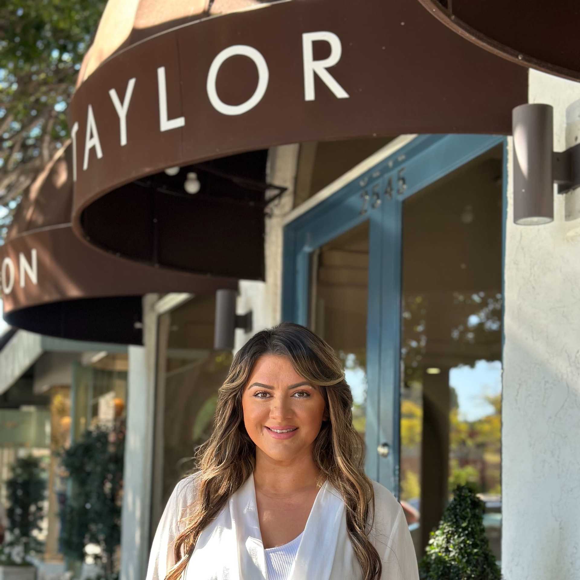 Portrait of Lucy Miller, a professional stylist at Mark Taylor Salon & Spa, showcasing their expertise and style.